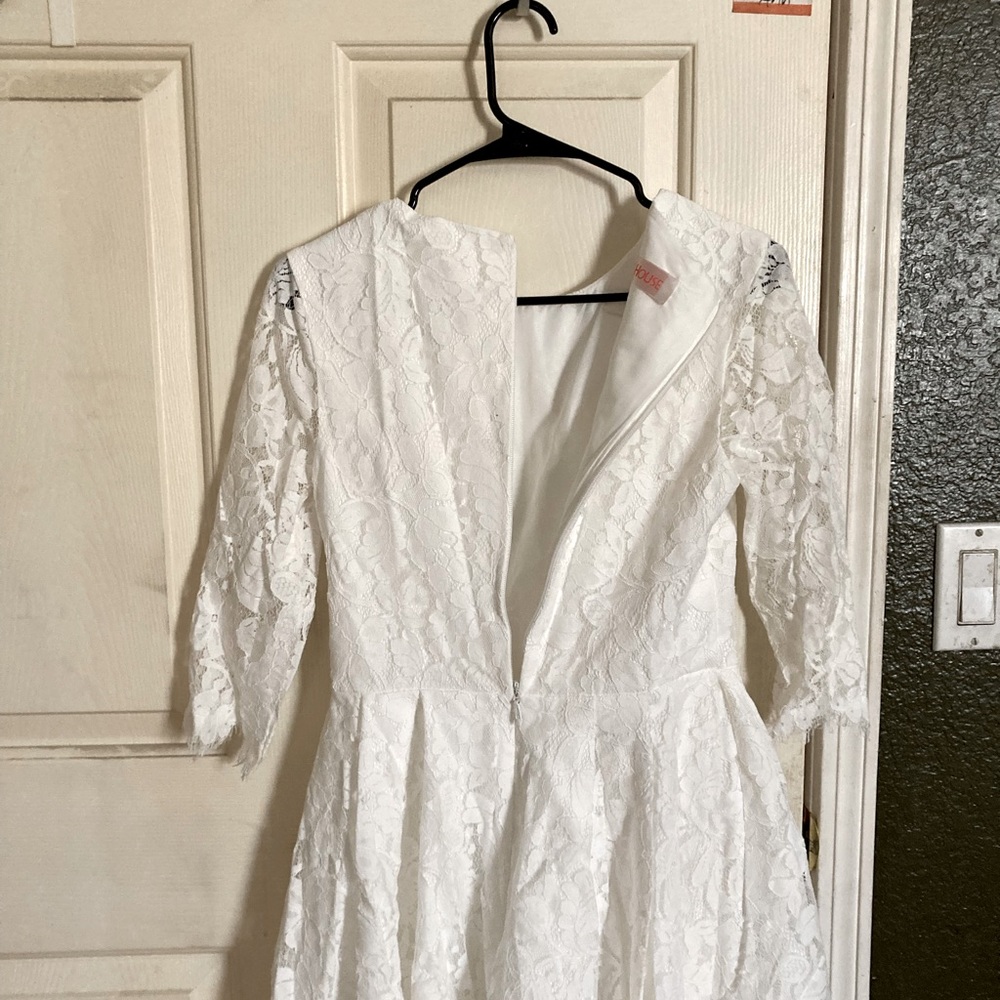 JJ’s House wedding dress, long sleeves, below the knee. Size 8.